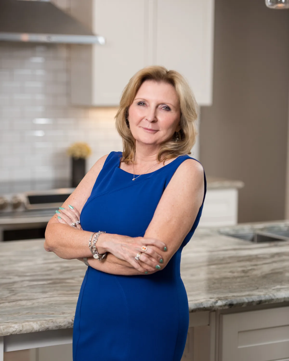 Bethanne Baer, Broker and Owner of Bear Team Real Estate, in an Orlando kitchen